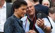 A man takes a selfie with Sahra Wagenknecht before her speech. The faction leader of Die L...