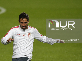 Monaco's player Joao Moutinho warms up during a training session on the eve of the Champions League football match opposing SL Benfica to AS...