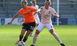 Rush Littlejohn of London Bees holds of Aimee Palmer of Manchester United Women during Wo...