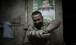 A Palestinian worker makes a pot made out of kneaded mud in one of the largest pottery wor...
