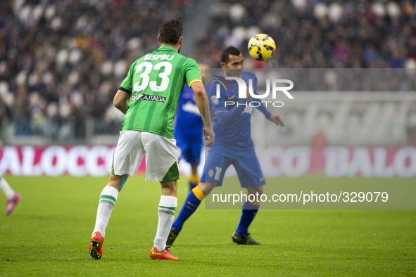  Andrea Rispoli and Carlos Tevez during the Serie A match between Juventus FC and Parma FC. at Juventus Stafium  on november 9, 2014 in Tori...