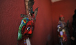 A Nepalese devotees impersonate as deity wearing traditional deity clothes and ornaments f...