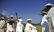 Nepalese priest playing traditional instruments at the premises of Shikali Temple during c...