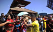 Nepalese devotees offering holy wine towards devotees during celebration of Shikali Festiv...