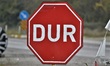 A traffic sign reading 'Stop' is seen outside a gas station on the outskirts of Caycuma di...