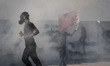 Clashes between anti-regime protesters and riot police after preventing the rally in the a...
