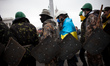 Anti-government protesters take part in demonstration on Maidan square in Kiev on February...
