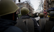 Anti-government protesters stand in front of the parlement as they take part in demonstrat...