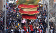 Locals carry as well as rotates top part of a chariot of Lord Narayan across the streets o...