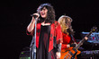 Musicians Ann Wilson (L) and Nancy Wilson of Heart perform in concert as part of the San A...