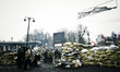 Protesters fortify the barricade on Hrushevskoho street with sandbags 