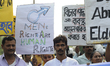 Indian men and women with signs during the celebration of International Men's Day in Kolka...