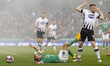 Karl Sheppard of Cork fouled by Sean Hoare of Dundalk during the Irish Daily Mail FAI Cup...