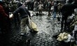 Protesters fortify the barricade on Hrushevskoho street with sandbags 