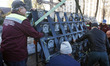 Communal workers dismantle the Heavenly Hundred Memorial,the more than 100 activists kille...
