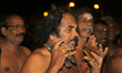 Tamil Hindu devotee sings religious prayers during the 12th night of the Nallur Festival a...