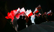 People attend 'White-and-red independence march' to celebrate the 100th anniversary of Pol...