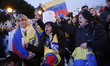 Protestors  shout slogans during a protest against the Venezuelan government in Madrid, Sp...
