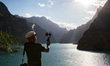 Shishkat, Pakistan, 25 September 2018. Tourists photograph the Lake Attabad on the Hunza R...