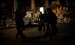 Anti-government protesters clash with the police during their storm of the Independence Sq...