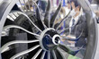 A visitor looks at IHI Aerospace engine during Japan Aerospace 2018 air show in Tokyo, Jap...