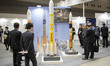 Mitsubishi Heavy Industries' N-PPON launch vehicle models are displayed during Japan Aeros...