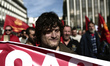 Workers and employees of the private sector take part to a protest march outside the Parli...