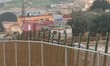 A general view of the border fence near Farkhana at the Morocco–Spain border in the city o...