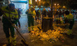 Street cleaners work during the fourth night of garbage collection strike keeping the the...