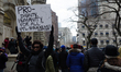 Protesters have gathered in Water Tower place on the morning of Black Friday, and then wal...