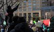 Protesters have gathered in Water Tower place on the morning of Black Friday, and then wal...