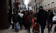 Protesters have gathered in Water Tower place on the morning of Black Friday, and then wal...