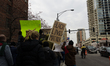 Protesters have gathered in Water Tower place on the morning of Black Friday, and then wal...