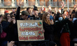 Students applause a discourse. Highschool students and professors demonstrated together ag...