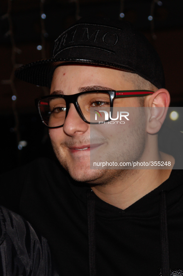 Italian rapper Rocco Hunt, winner in the "New proposals" at the Sanremo Festival 2014, at Shopping Center 8 Gallery, in Turin, on November 2...