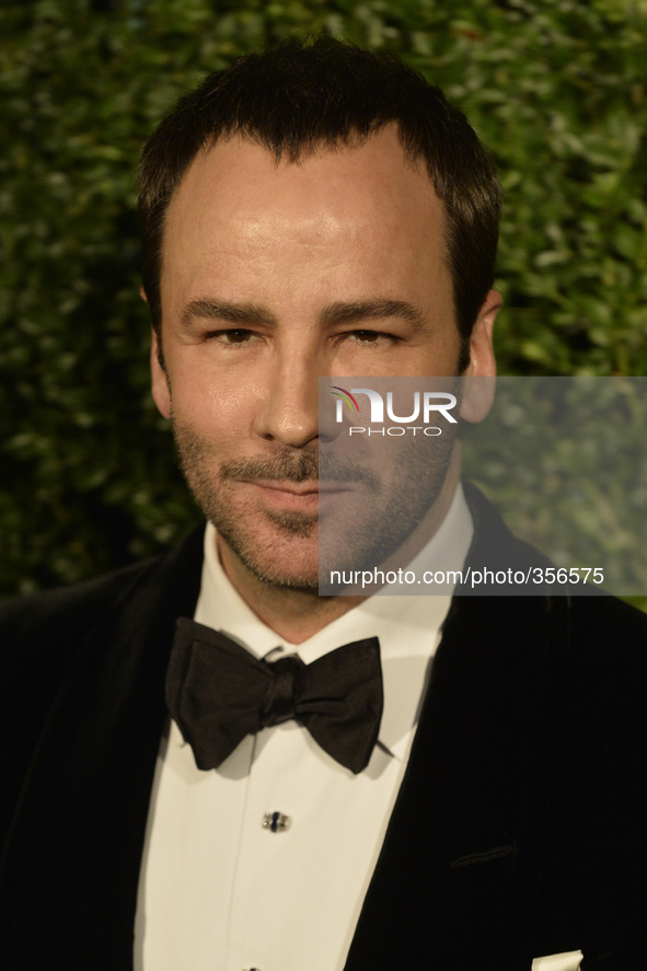 Tom Ford and guest attends the "London Evening Standard Awards". 
London Palladium, London, UK. 30th November 2014