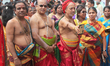 Tamil Hindu priests take a selfie with their wives during the Murugan Ther Festival (Murug...