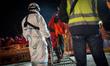 A group of rescued migrants is being transferrd to the Care unit, where the Red Cros staff...