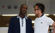 Clarence Seedorf (L) and Hidetoshi Nakata (R) arrives at Suvarnabhumi Airport in Samut Pra...