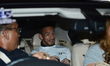 Hidetoshi Nakata sits in a car after arrives at Suvarnabhumi Airport in Samut Prakan, Thai...