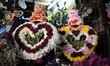 Stuffed toy bears adorn heart-shaped wreathes for sale a day before Valentine's Day at the...