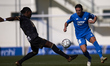 David Otto of Hoffenheim and Jordan Botaka of Sint Truiden during the friendly match betwe...