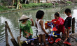 Citizens use dirty river water for their daily needs at Cikarang regency, West Java on Sat...