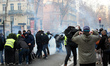 Protesters thraw projectiles towards riot police. For the Act X (Act 10) of the Yellow Ves...