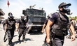ISTANBUL, TURKEY--Police arriving in Taksim Square. Police fired tear gas and water cannon...