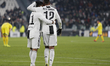  Douglas Costa of Juventus celebrates with his team-mate Alex Sandro after scoring the ope...