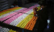 Palestinians work at candy factory in Gaza City on January 22, 2019. 