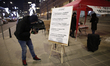 A list of demands for changing the state run broadcaster TVP is seen during a rally in fro...
