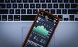 A graph displaying the Nike stock price is seen on the Stocks market application in this p...