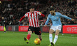  Bryan Oviedo of Sunderland in action with Manchester City's Benjamn Garr during the Check...